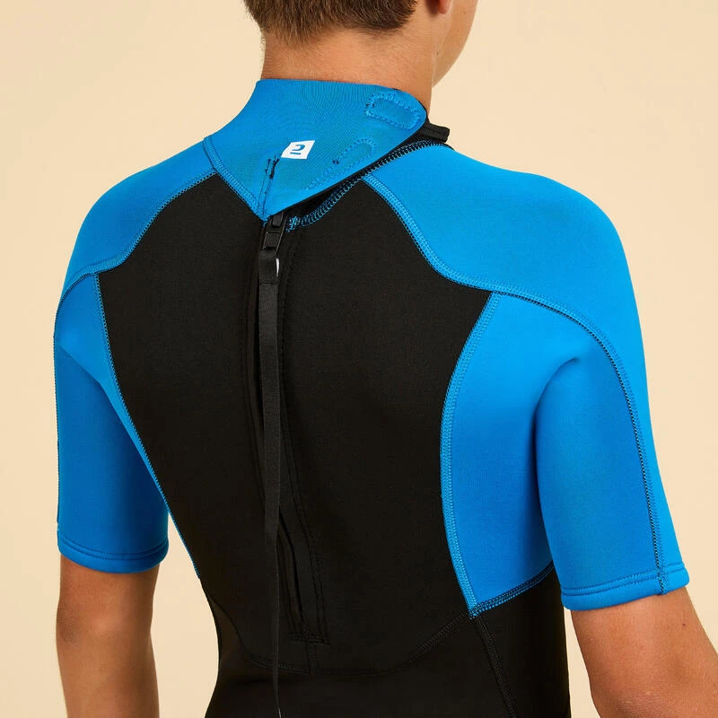 COMBINAISON SURF SHORTY 500 NEOPRENE 1.5MM GARCON BLEUE NOIRE 4 COMBINAISON SURF SHORTY 500 NEOPRENE 1.5MM GARCON BLEUE NOIRE – Image 4